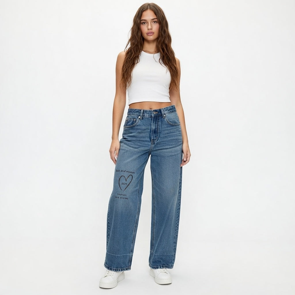 Woman wearing blue jeans with a heart design on a white background
